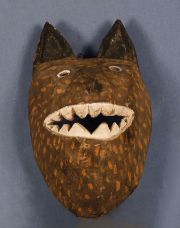 Mascara Chane, Felino, de palo borracho h: 31 cm. Hacia 1930/40