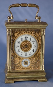 Reloj de viaje francs caja de bronce. A.Santini. Con asa. 19 cm. (436)