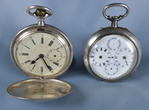 Tres Relojes Bolsillo: A.Huguenin & Sons. Faltan agujas y perilla; Omega con faltantes. (583 y 584). y otro + peq. S/N
