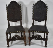 Seis sillas espaolas, asiento y respaldo en cuero con aguila bicefala