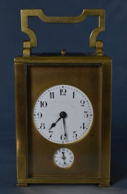 Carriage Clock francs, caja de bronce. Altura 10 cm, con estuche de cuero - cuadrado sin ornamento. C. LL.