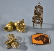 Cuatro Piezas, mariposa y silla en filigrana, len en bronce y perro en esmalte .