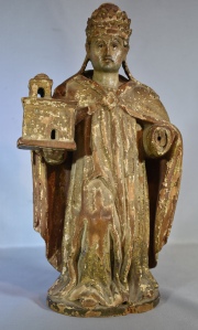 San Agustn sosteniendo una iglesia en la mano. Talla en madera policromada. (Falta la mano). 33 cm. Desperfectos.