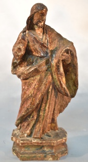 JESUS, figura de madera tallada, estucada y policromada. Saltaduras. Falta mano. Alto: 26 cm.